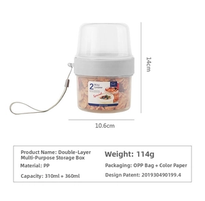 Detail view of 2-way container showing split 310ml and 360ml dual compartments for snacks