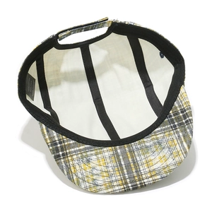 Detail shot of the 100% cotton plaid baseball cap showing inner lining and laundry label