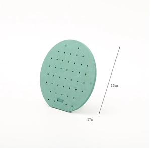 Green minimalist jewelry display stand with dimensions 12cm height and 57g weight