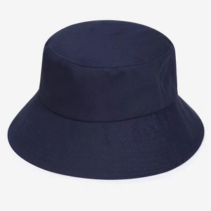 Detail of a dark blue cotton fisherman hat with premium stitching and sun protection fabric