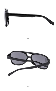 Detail view of black aviator sunglasses showing side frame and back design profile