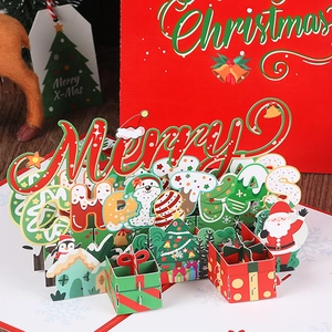3D pop-up Christmas card featuring Merry Christmas letters with Santa and tree motifs