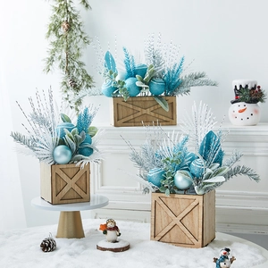 Mini Christmas tree in wooden box with blue and silver ornaments for tabletop decor