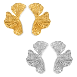Exaggerated ginkgo leaf earrings in gold and silver finish with hammered texture