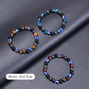 10mm Tiger Eye and Evil Eye beaded bracelet with polished black obsidian stones