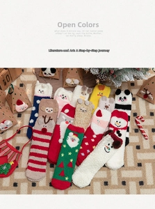 Festive Christmas coral fleece socks with reindeer and Santa patterns on a vintage rug