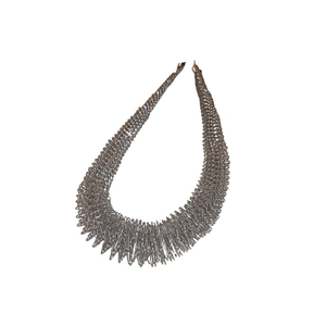 Dramatic silver spring coil necklace with chunky industrial design and metallic choker style