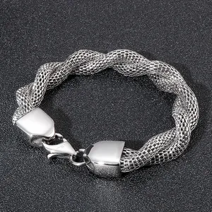 Close-up of 316L stainless steel men's snake chain bracelet on textured black background