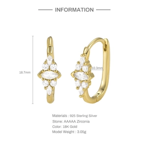 Macro detail of S925 silver 18K gold hoop earrings with marquise and round 5A zircons