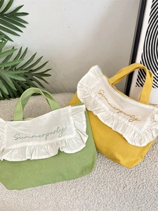 Canvas ruffle handbags in green and yellow with Summerparty embroidery and white trim