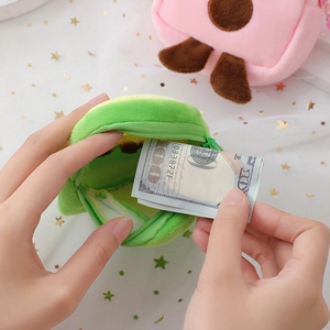 Cute plush 3D avocado coin purse with a zipper, showing interior storage capacity