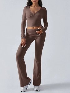 Detail view of coffee brown knitted long sleeve V-neck top and wide leg pants set for women
