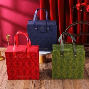 Three premium square gift bags in red, blue and green with vintage damask patterns