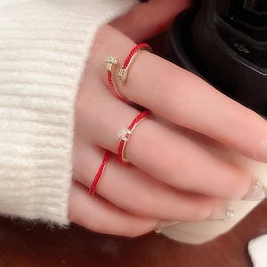 Three-piece red and gold minimalist snake-style rings with H-letter and nail design