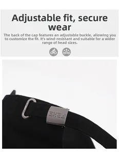 Detail of adjustable metal buckle on a black vintage distressed cotton baseball cap