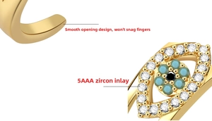 Macro detail of gold plated evil eye ring showing 5AAA zircons and smooth open band finish