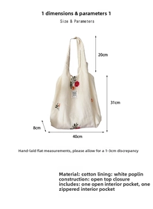 Detailed dimensions of off-white canvas tote bag featuring floral embroidery and pockets