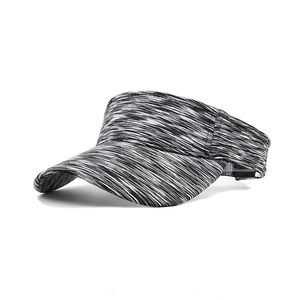 Detailed texture of breathable space-dye fabric on a striped sports sun visor hat