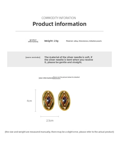 Detailed view of vintage oval earrings with purple enamel flowers and faux pearl inlay