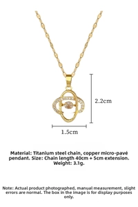 Detail of titanium steel gold necklace with sparkling cz inlaid double oval pendant