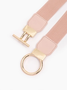 Detail view of pink elastic waist belt featuring gold ring and T-bar metal buckle closure