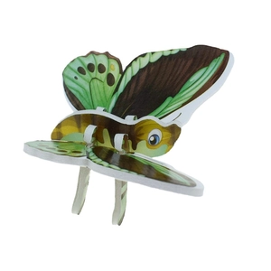 Close-up of 3D butterfly paper puzzle showing realistic green wing texture and snap-fit joints