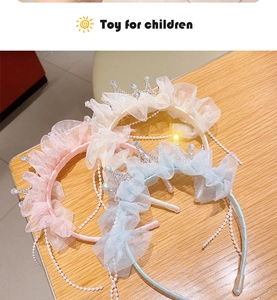 Detailed macro shot of lace mesh headbands with rhinestones and faux pearls for girls