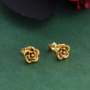 Vintage French style gold 3D rose flower earrings with detailed textured metal petals