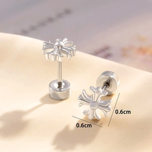 Minimalist silver cross stud earrings in titanium steel with screw back detail
