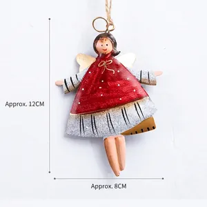 Vintage metal angel Christmas ornament in red and gold finish, height 12cm width 8cm