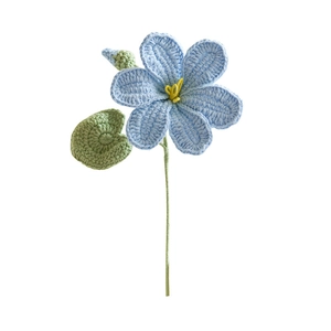 Handmade knitted blue flower stem with yellow center and green leaf on white background