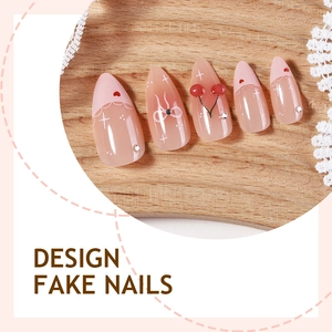 Pink cherry almond fake nails with 3D red cherry accents and white bow nail art