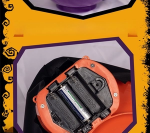 Detail of the battery compartment for the motorized Halloween ghost fruit bowl prop