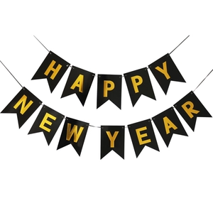 Black and gold Happy New Year banner with fireworks motif for holiday party decoration