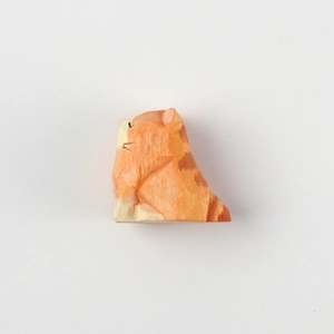 Handcrafted orange wooden cat figurine with natural carved texture and striped finish