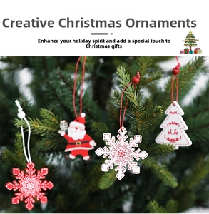 Detailed view of wood Christmas ornaments with festive patterns on pine branches