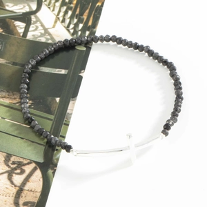 Natural faceted stone beaded bracelet featuring a silver curved cross charm for women