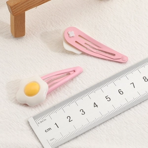 Poached egg and flower hair clips for girls with ruler scale measurement reference