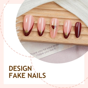 Elegant red French striped almond fake nails with gold star and heart patterns