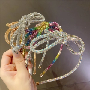 Elegant side bow headbands with colorful sparkling rhinestones in three vibrant finishes