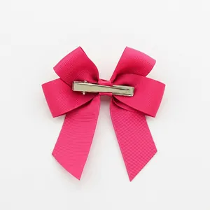 Handmade rose red grosgrain ribbon hair bow with silver metal duckbill clip back view