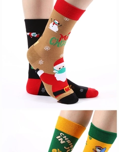 Detailed view of Christmas mid-calf socks with Santa and Snowman holiday patterns