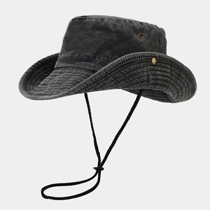 Detail of washed grey cotton sun hat featuring side snaps and adjustable chin strap