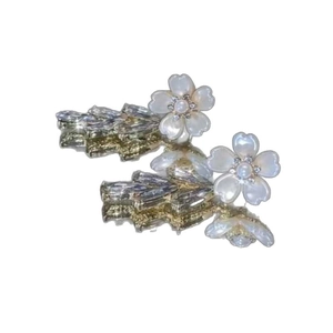 Silver needle flower earrings with mother of pearl petals and zircon tassels