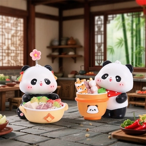 Cute cartoon panda figurines sitting and standing with food bowls on stone surface