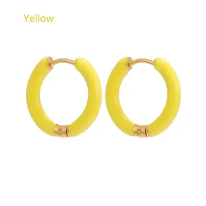 Close-up of 12mm yellow enamel hoop earrings with polished stainless steel finish