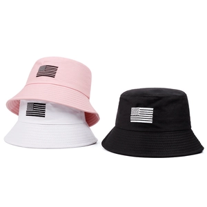 Detail view of cotton bucket hats with flag embroidery and reinforced brim stitching