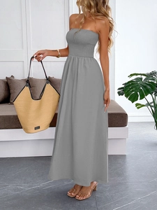 Elegant grey bandeau maxi dress with elastic bodice and flowy A-line skirt for summer