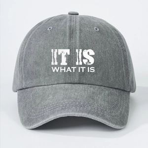 Washed grey cotton baseball cap featuring It Is What It Is slogan print and sun visor