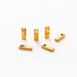 Detail of 1.8mm vacuum gold plated rectangle alphabet bead charms for DIY jewelry